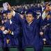 A graduate cheers as a fellow classmate receives a diploma  during Pioneer's 2013 graduation ceremony, Thursday June 6. Courtney Sacco I AnnArbor.com